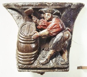 Misericord uit een koorbank die een man afbeeldt die een vat hamert, uit de Kerk van Saint-Etienne des Tonneliers, Rouen